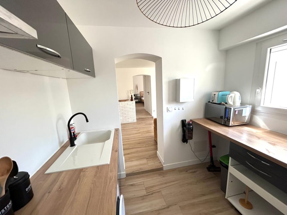 Kitchen or kitchenette, stove, toaster