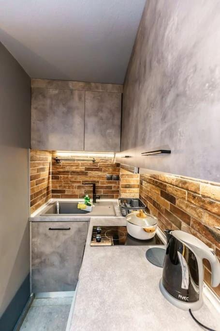 Kitchen or kitchenette, stove