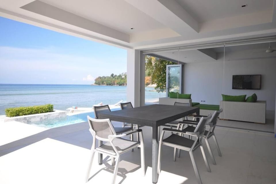Patio, View (from property/room), Seating area, Dining area, Beach, Pool view, Sea view, Swimming pool