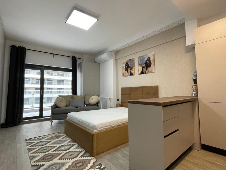 Bed, Seating area, wardrobe
