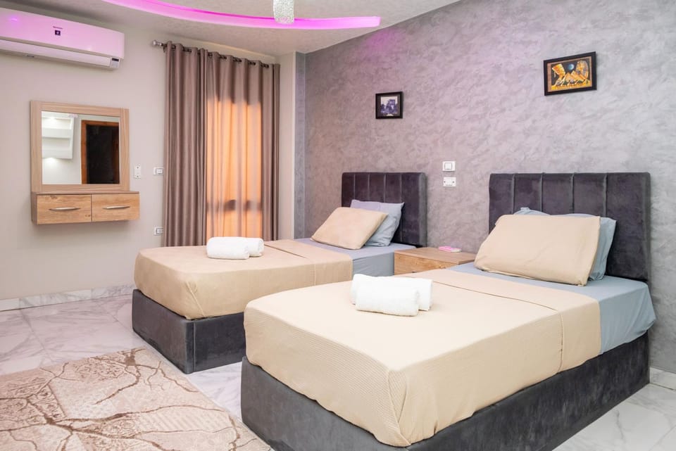 Bed, Photo of the whole room, Bedroom, towels, air conditioner
