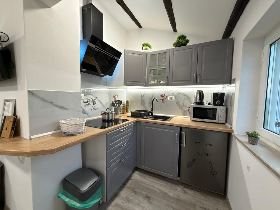 Kitchen or kitchenette, stove, toaster