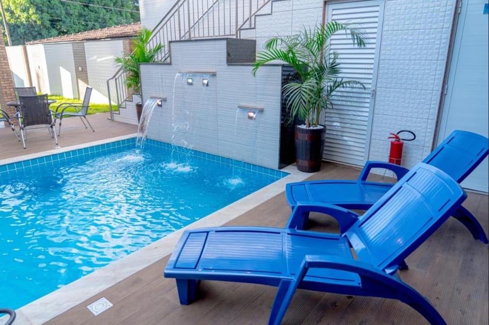 Swimming pool, sunbed