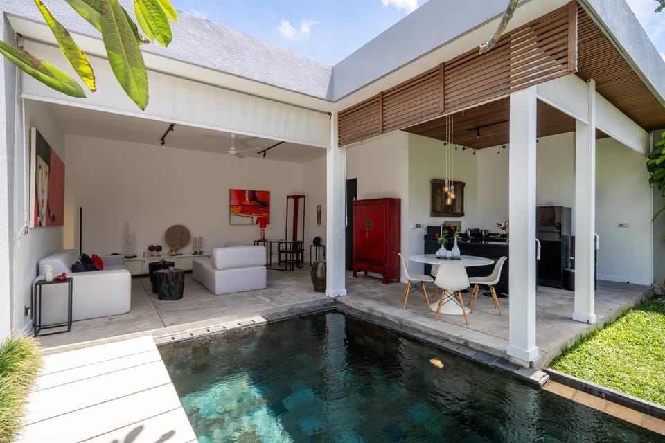 Property building, Living room, Seating area, Garden view, Swimming pool