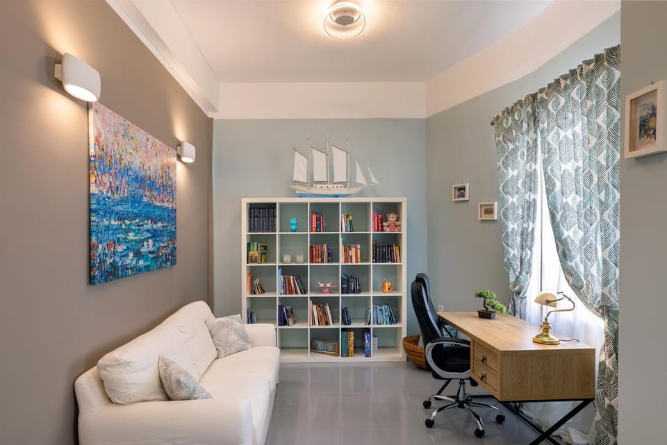Bed, Library, Living room, Seating area