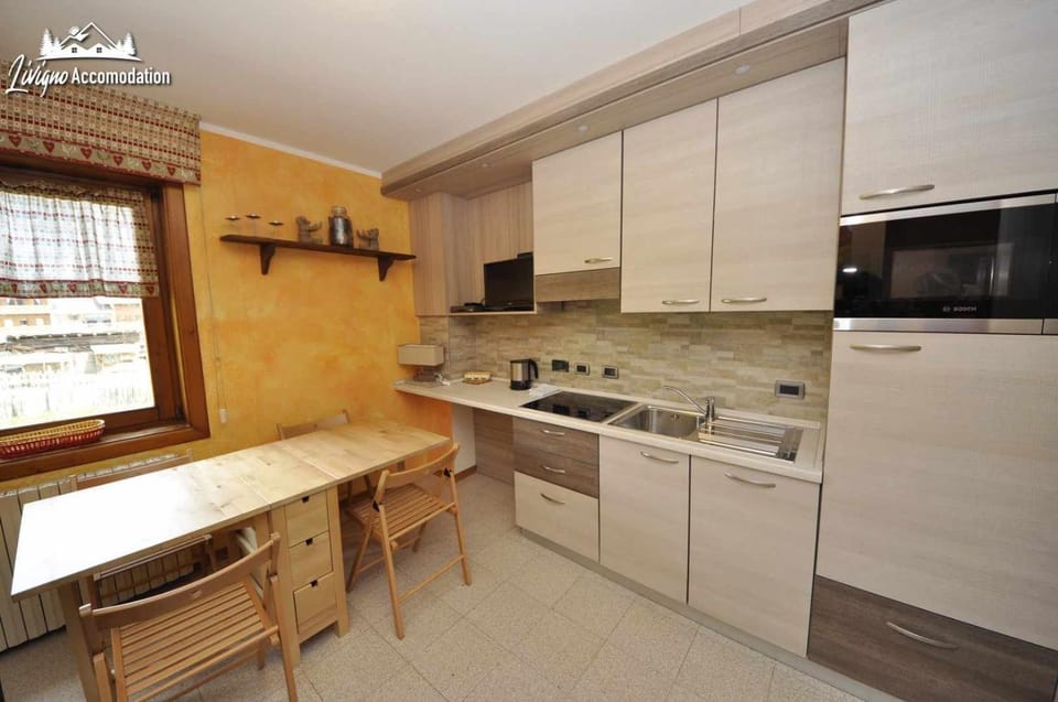 Baita Carosello Apt 4 by Livigno Accomodation Apartment in Canton of Grisons