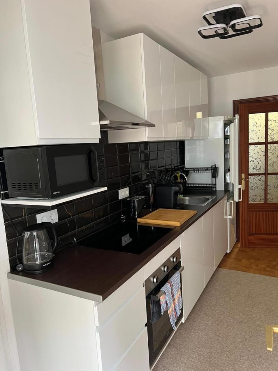 Kitchen or kitchenette, oven, stove