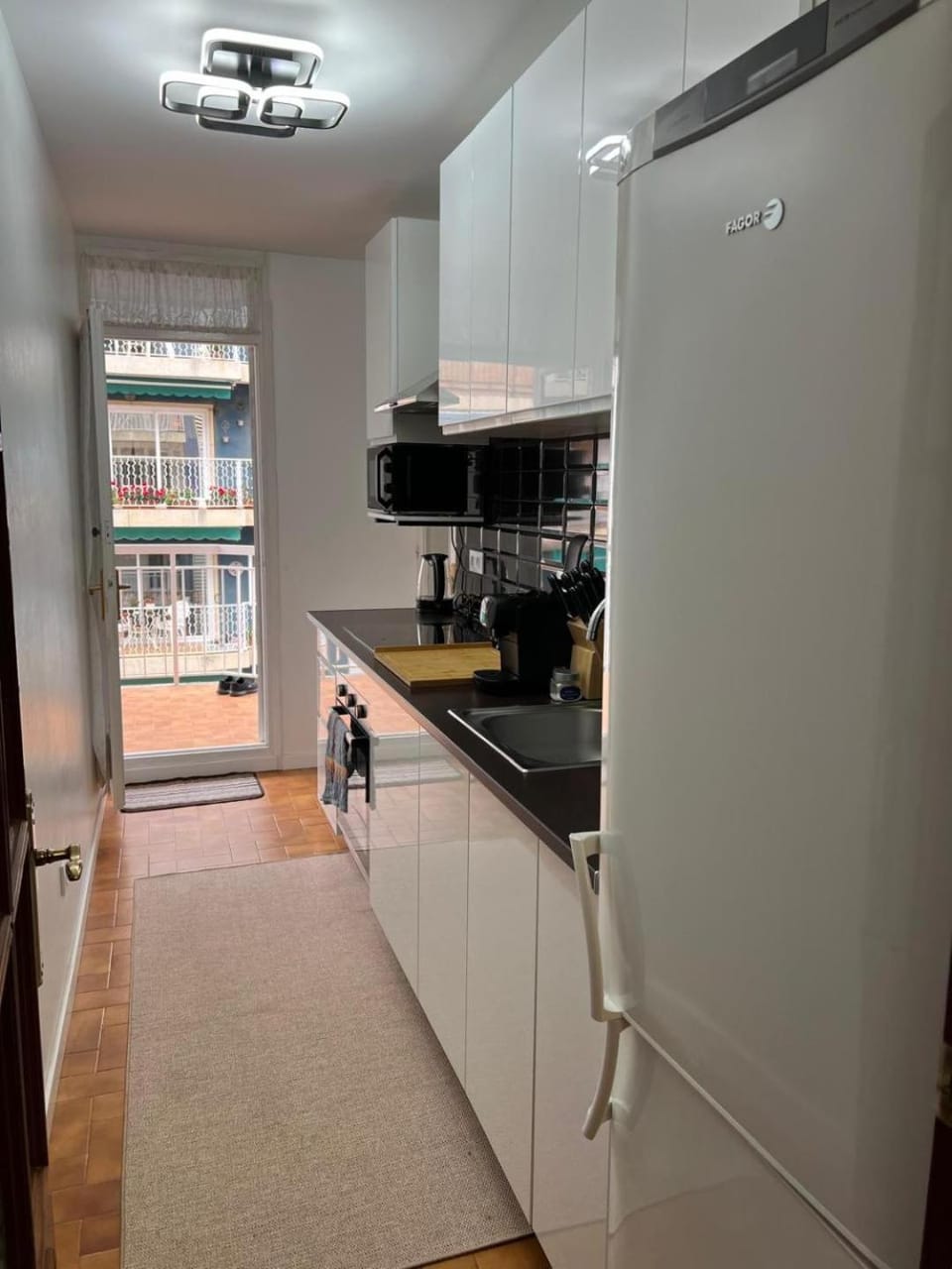 Kitchen or kitchenette, oven, stove