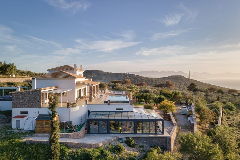 Property building, Natural landscape, Mountain view, Sea view