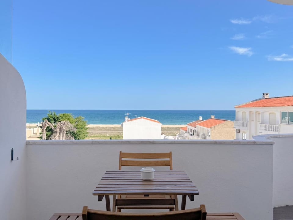 View (from property/room), Balcony/Terrace, Dining area, Beach