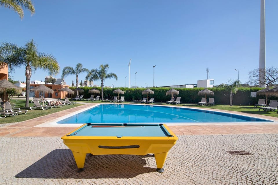 Property building, Living room, Swimming pool