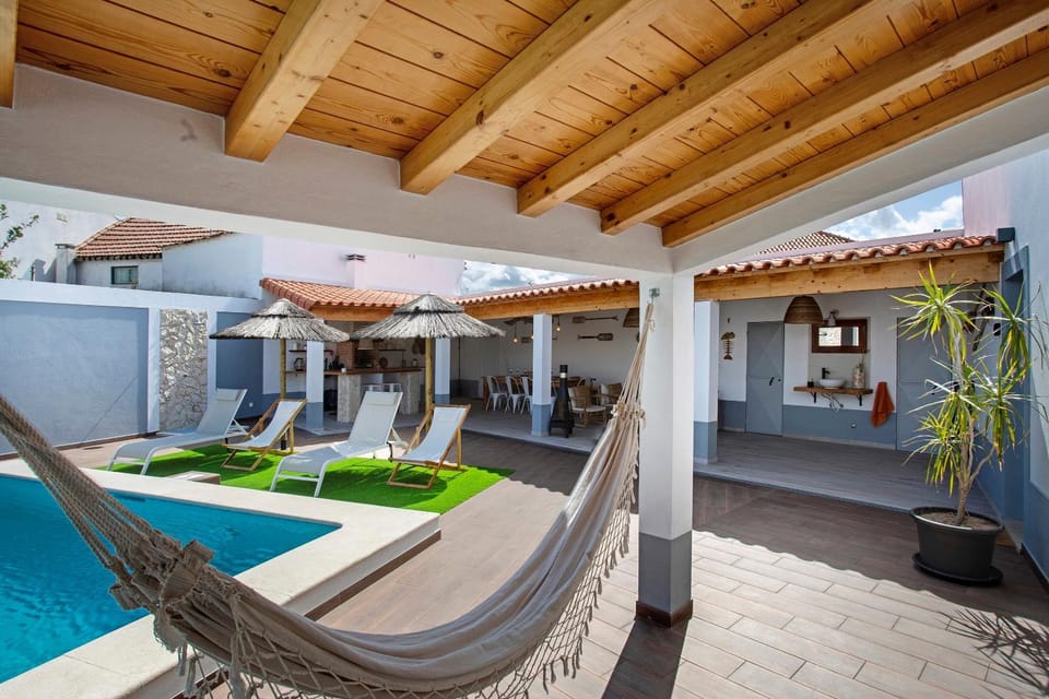 Property building, Living room, Swimming pool