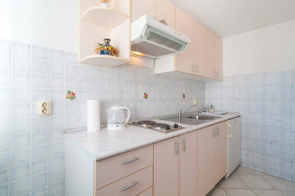 Kitchen or kitchenette, stove