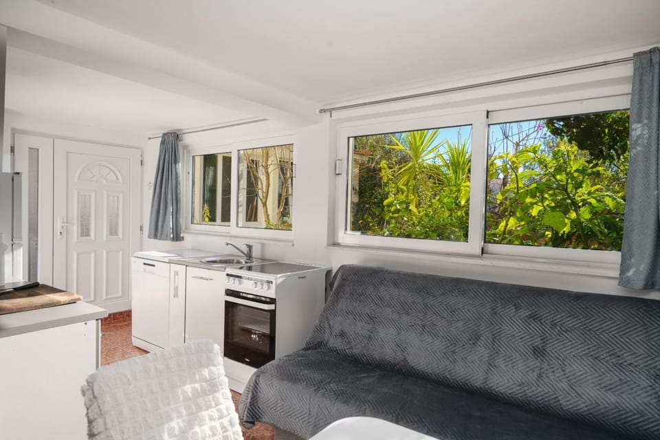Kitchen or kitchenette, Living room, Seating area, Garden view
