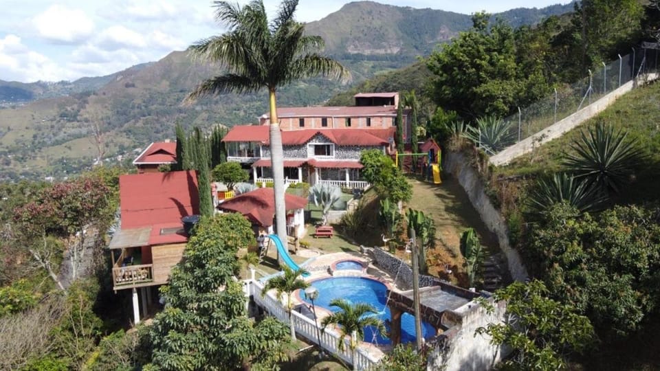 Chalet El Pinal - Copacabana Campground/ 
RV Resort in Bello