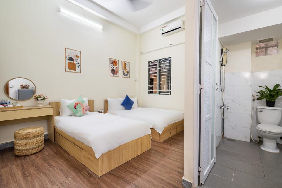 Toilet, Bed, Bathroom, Photo of the whole room, Bedroom, towels, air conditioner