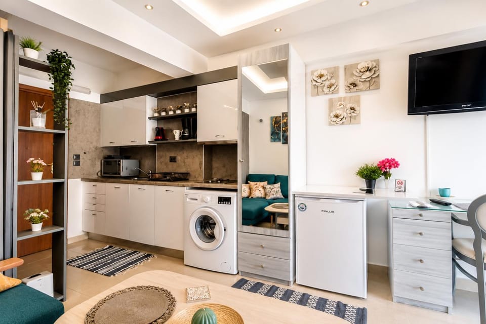 Kitchen or kitchenette, stove, washing machine