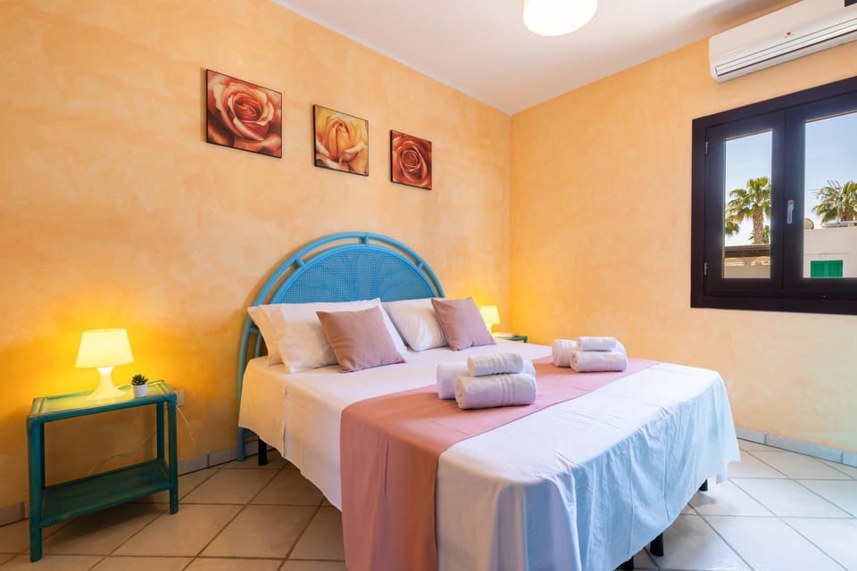Bed, Photo of the whole room, Bedroom, towels, air conditioner