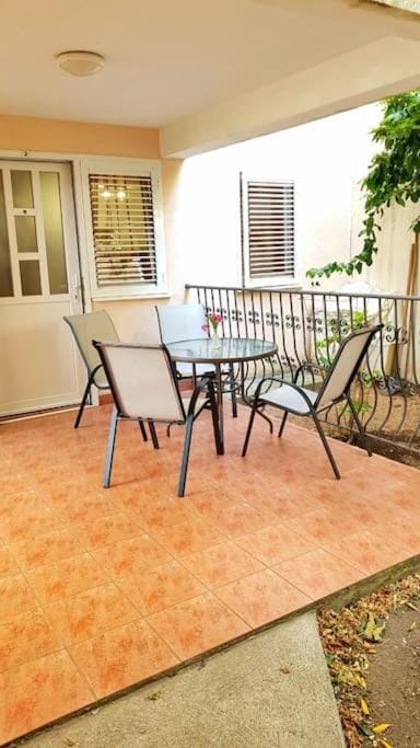 Apartment with a garden Petrovac Apartment in Budva Municipality