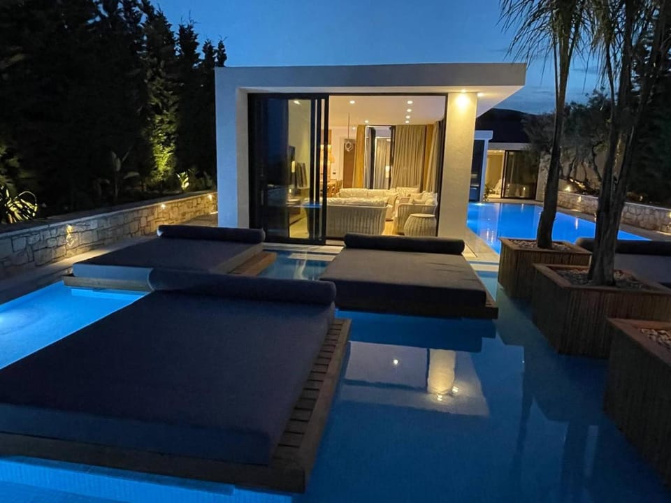 Property building, Night, Seating area, Pool view, Swimming pool