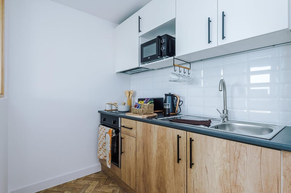 Kitchen or kitchenette, oven, stove