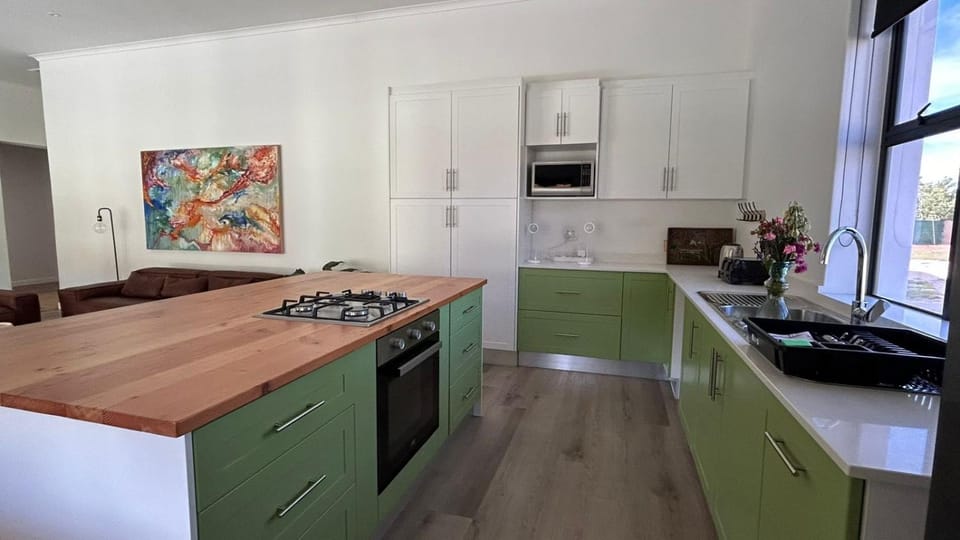 Kitchen or kitchenette, microwave, oven, stove, toaster