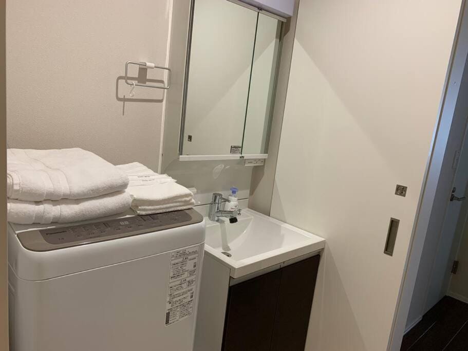 Bathroom, towels, washing machine