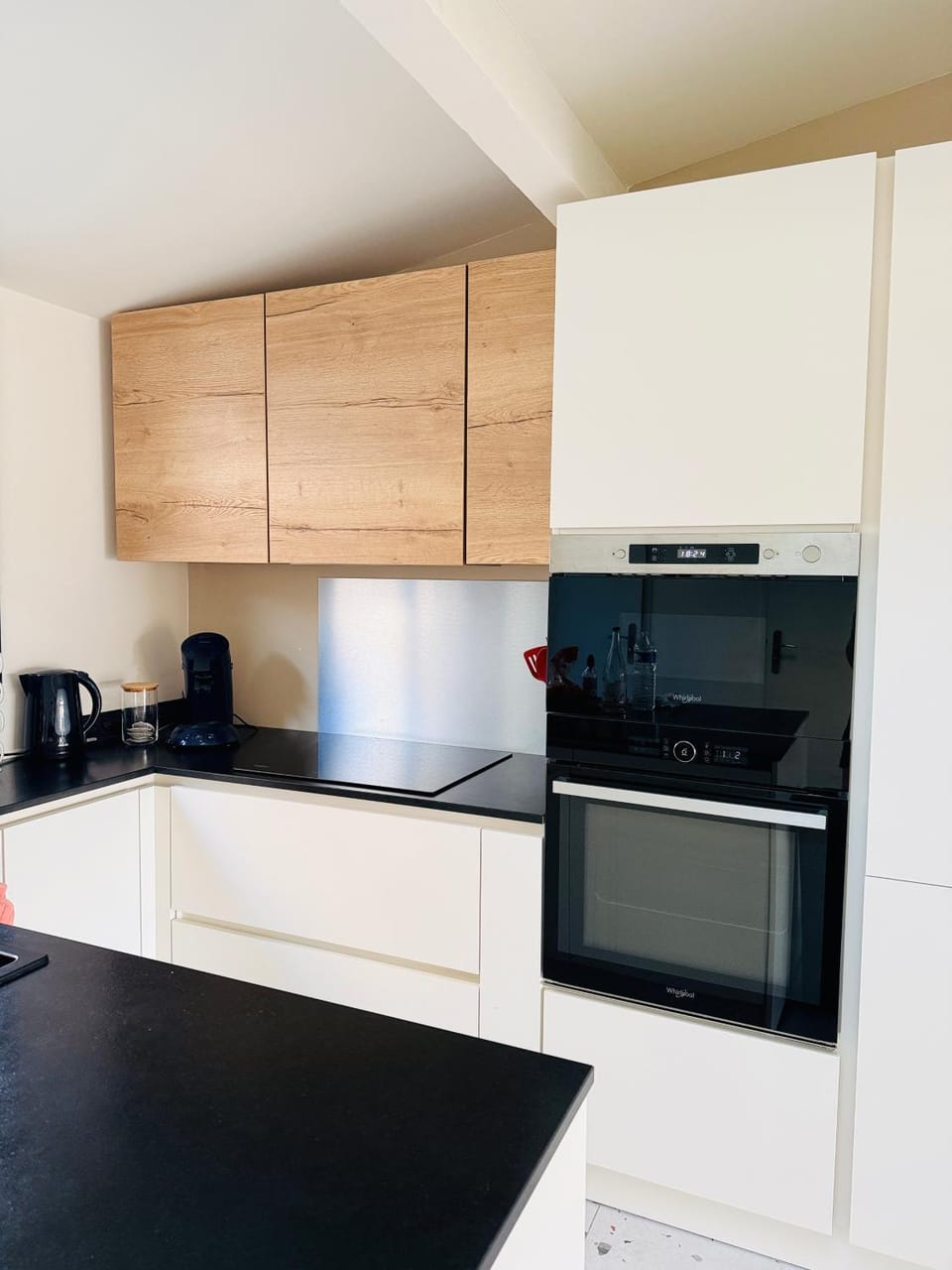 Kitchen or kitchenette, dishwasher, oven, stove