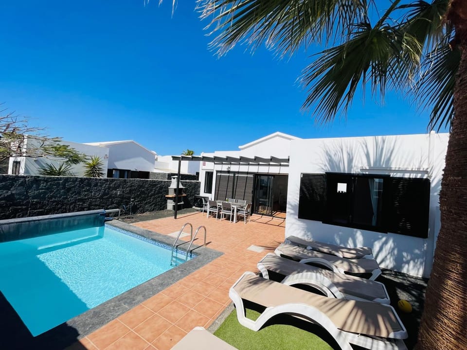 Property building, Living room, Swimming pool