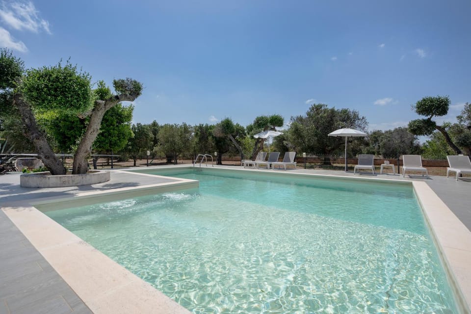 Property building, Living room, Swimming pool