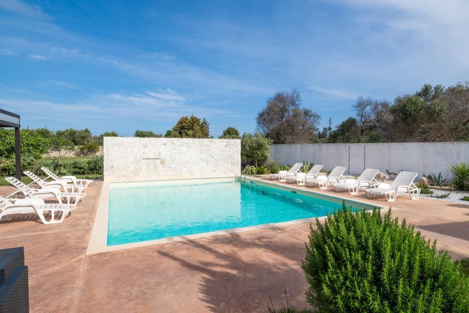 Property building, Living room, Swimming pool