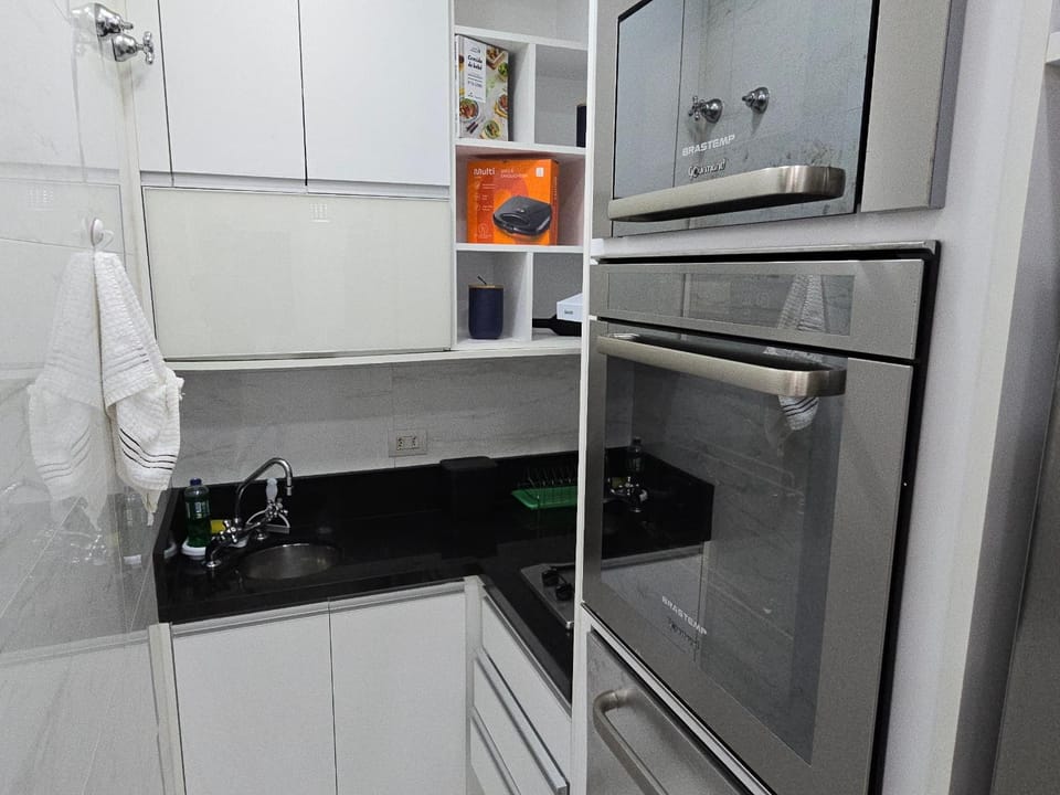 Kitchen or kitchenette, oven, stove