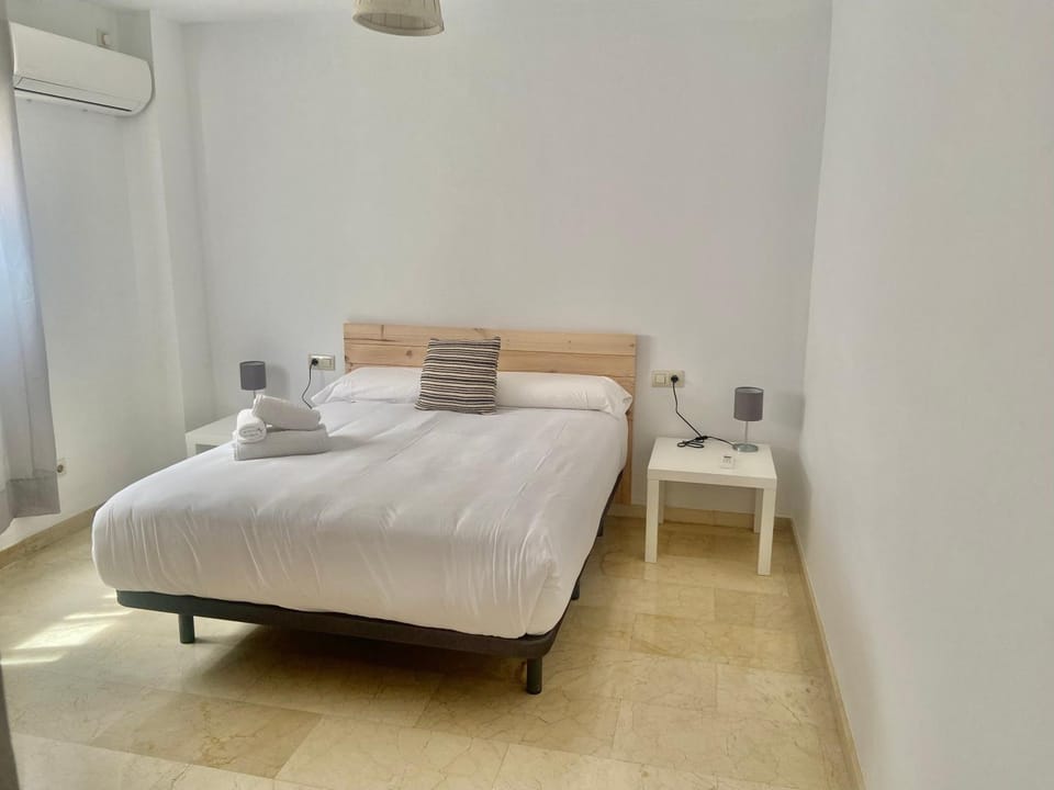 Bed, Photo of the whole room, Bedroom, towels, air conditioner
