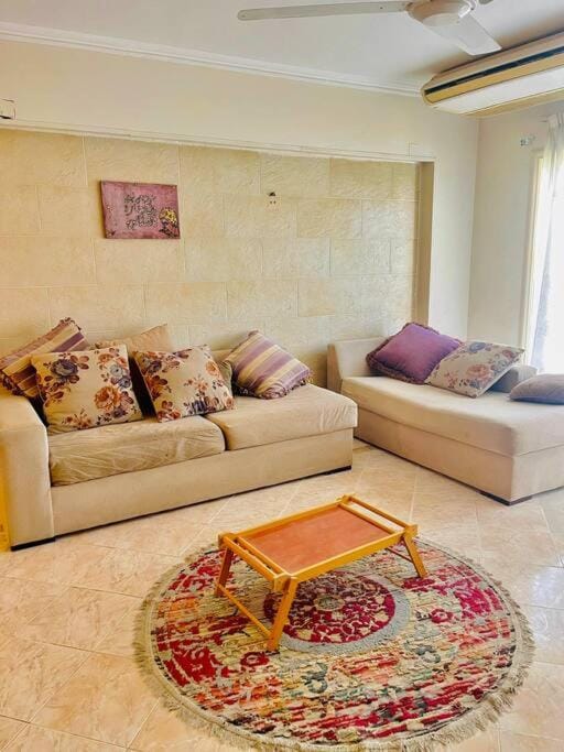 TV and multimedia, Living room, Seating area, fireplace, air conditioner