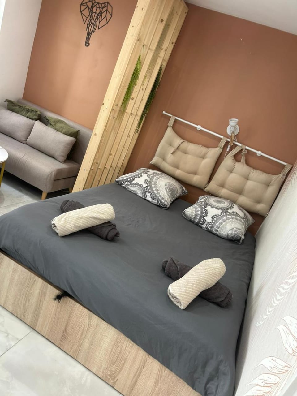 Bed, Living room, Seating area, Bedroom