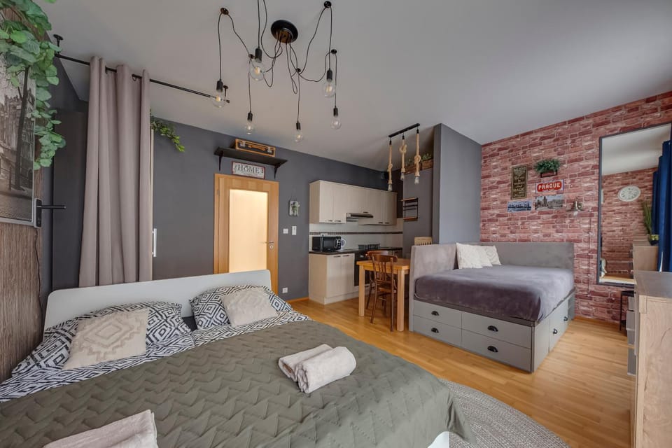 Bed, Kitchen or kitchenette, Seating area