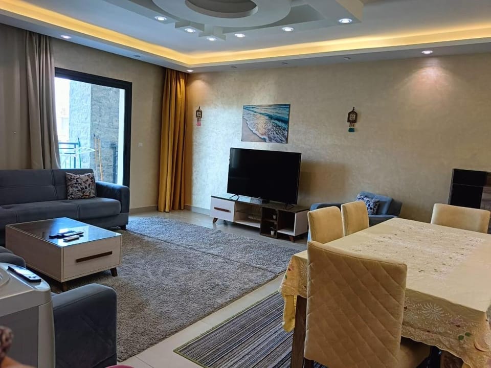 TV and multimedia, View (from property/room), Balcony/Terrace, Living room, Seating area, Dining area, Garden view, Lake view, air conditioner