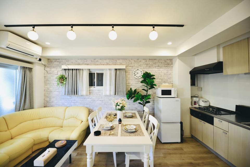 Living room, Dining area, minibar, stove, toaster, kitchen, air conditioner