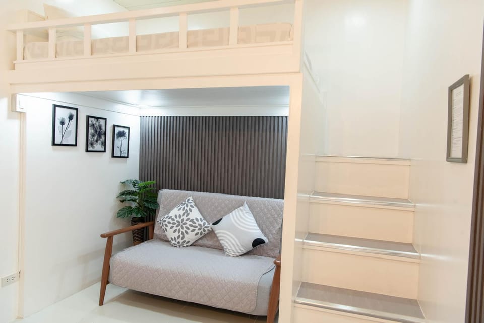 Bed, Living room, Seating area, Bedroom