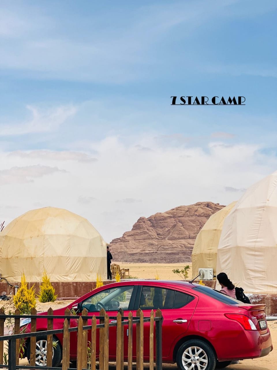 Nearby landmark, Day, People, Natural landscape, Text overlay, Mountain view, group of guests, Parking