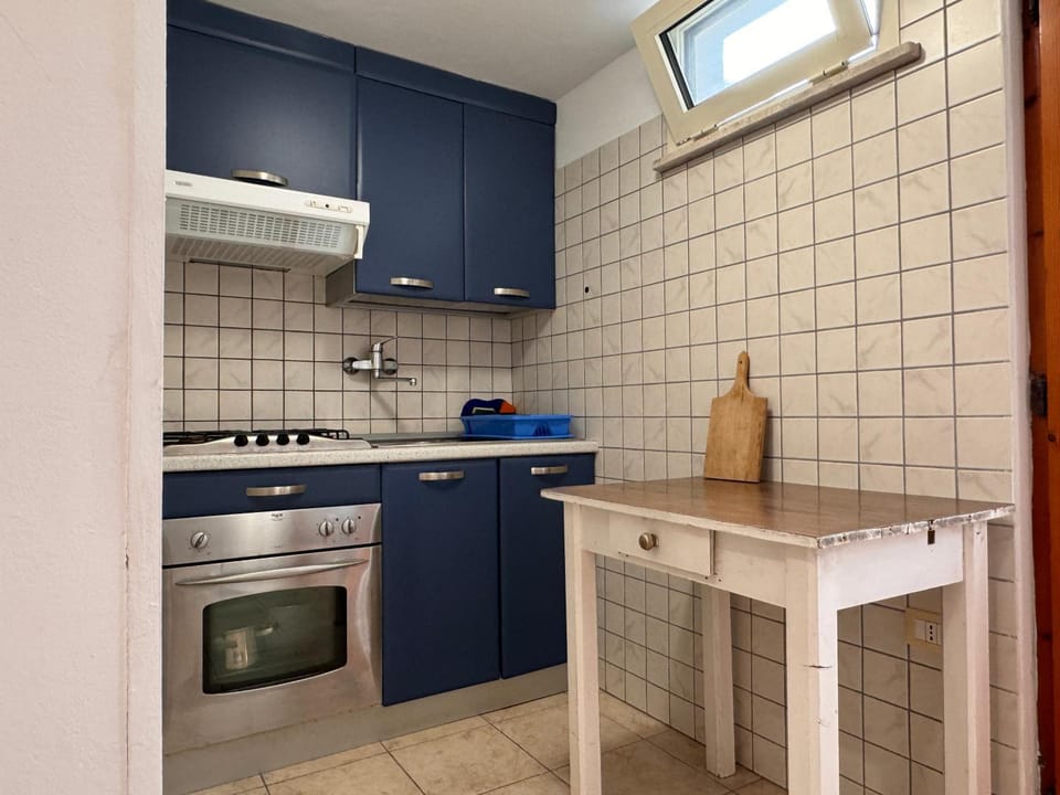 Kitchen or kitchenette, oven, stove, toaster