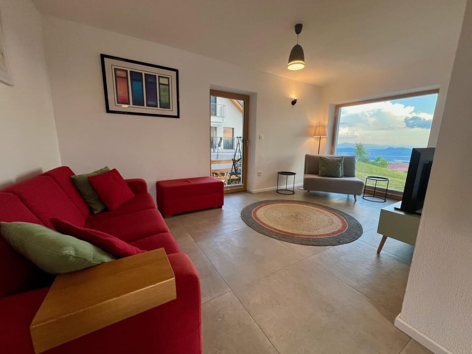 Property building, Communal lounge/ TV room, TV and multimedia, Living room, Seating area, Evening entertainment