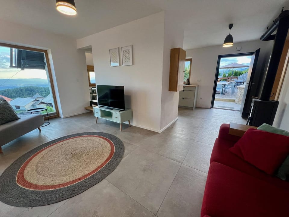 Property building, Communal lounge/ TV room, TV and multimedia, View (from property/room), Living room, Seating area, Evening entertainment
