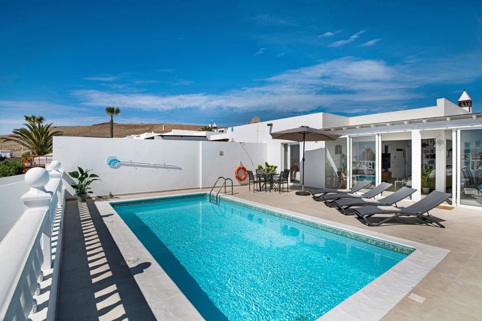 Property building, Living room, Swimming pool