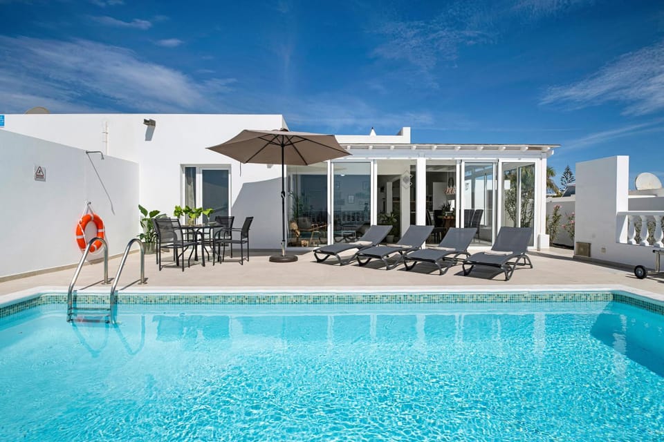 Property building, Living room, Swimming pool