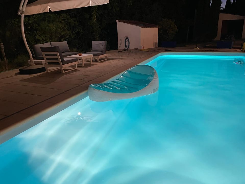 Night, Pool view, Swimming pool, sunbed