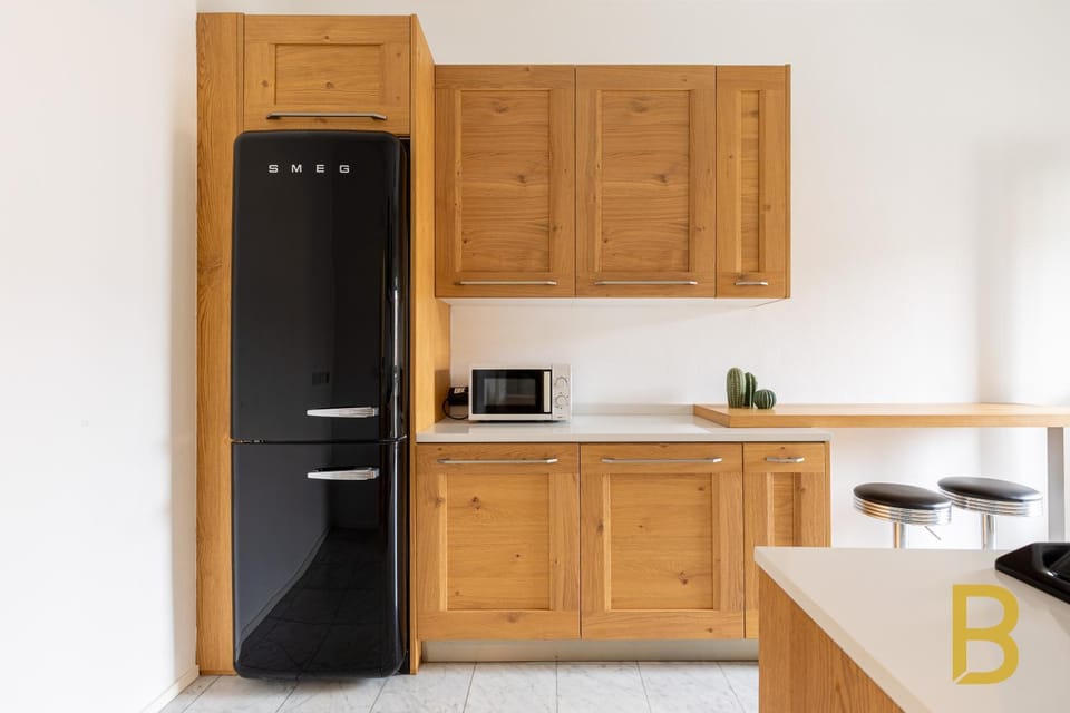 Dining area, microwave, stove, kitchen