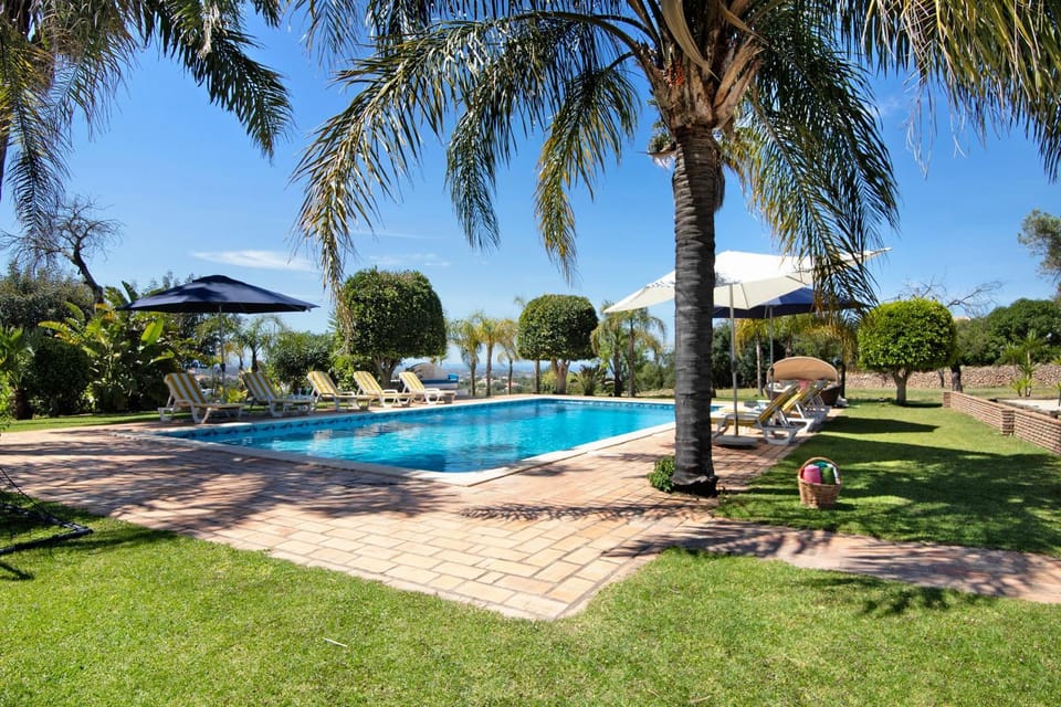 Property building, Living room, Swimming pool