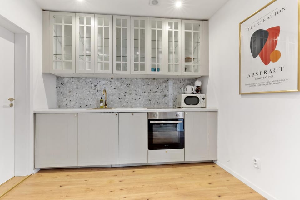 Kitchen or kitchenette, dishwasher, microwave, oven, stove, kitchen