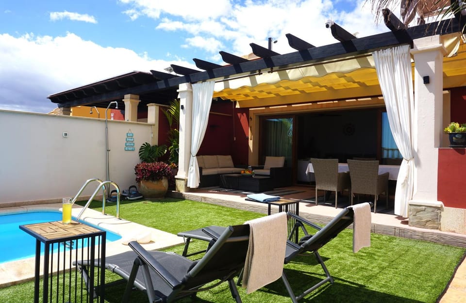 Patio, Day, Seating area, Pool view, Swimming pool, sunbed